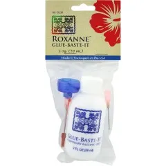 Frontalansicht der Roxanne-Glue-Baste-It-Verpackung mit Blumenmuster und Anwendungshinweisen.