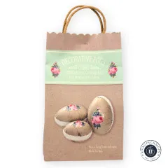 Tilda-Nähset-Verpackung „Decorative Eggs" als Kraftpapiertüte mit Rosenmotiv auf den Ostereiern, Frontalansicht