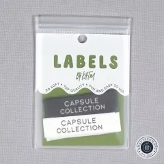 Frontale Ansicht der Verpackung mit den Labeln 'Capsule Collection'.
