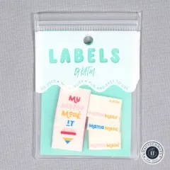 Frontalansicht der Verpackung mit den Labels „My Mama Made It", „Mama Made" und dem Herz-Label.