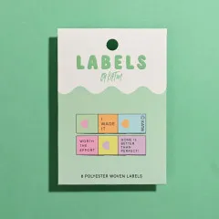 Verpackungsschachtel mit sechs Mini-Labels in Pastellfarben mit den Sprüchen „I Made It", „Worth The Effort" und „Done Is Better Than Perfect".