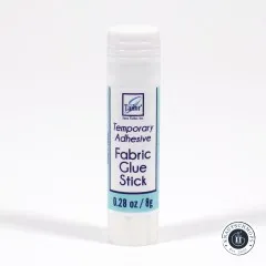 Verpackungskarte des June-Tailor-Stoffklebestifts mit Produktbeschreibung „Temporary Adhesive".