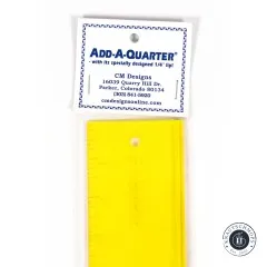 Nahaufnahme des Verpackungsetiketts mit Kontaktdaten von CM Designs zum Add-A-Quarter-Lineal.