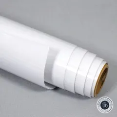 Nahaufnahme der aufgerollten Vinylrolle mit sichtbaren Lagen und Pappkern von der Stirnseite.