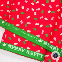 Stoffkante mit grüner Webleiste Ruby Star Society Merry Happy auf rotem Gummibärchen-Stoff
