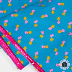Webkante mit Schriftzug „Trinketry" und Designer-Signatur Melody Miller.
