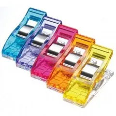 Fünf Wonder Clips in Blau, Lila, Pink, Orange und Gelb aufgefächert