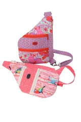 Zwei fertige Taschen: oben Mint-Lila mit Hasenmotiv über der Schulter getragen, unten Rosa mit Vogelmotiv als Cross-Body.